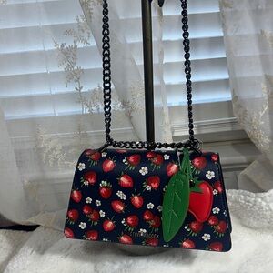 Steve Madden strawberry navy blue crossbody with strawberry bag charm